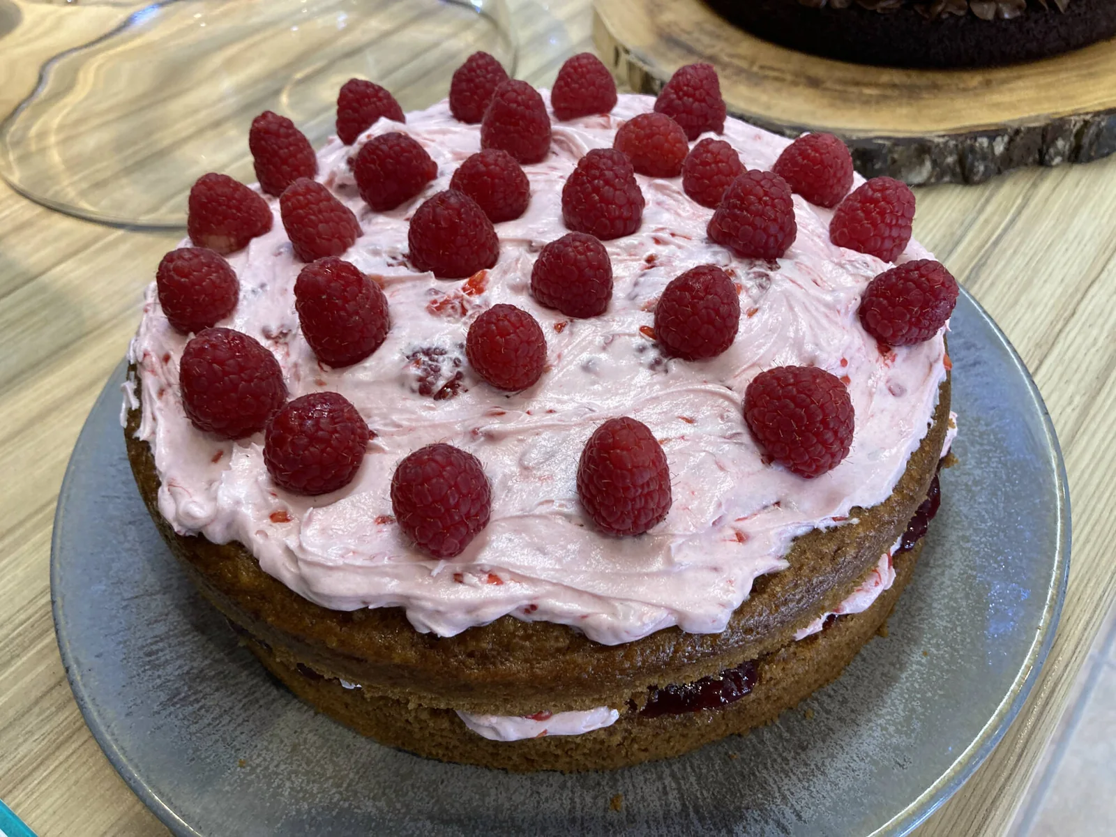 Fresh raspberry layer cake made at Plantarium Café